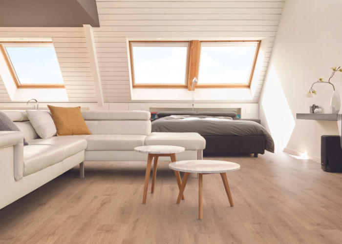 Wood-look luxury vinyl plank in a studio apartment.